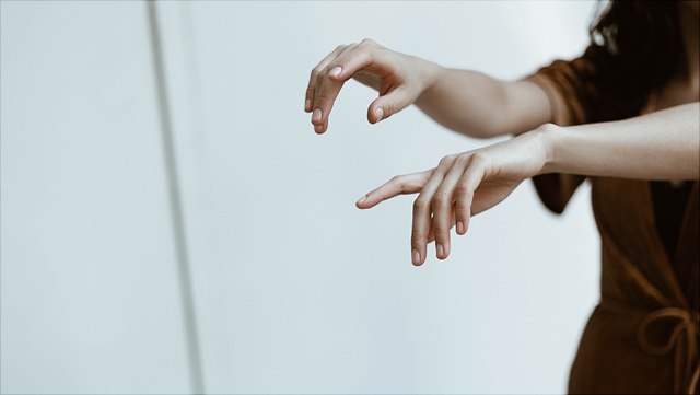 Hands of David Fanuel in motion